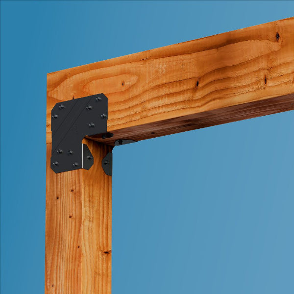 Wooden beam with metal bracket against a blue background