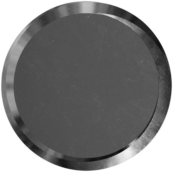 Round metallic object with a silver rim on a white background