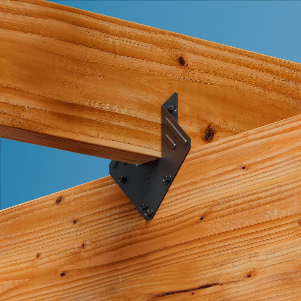 Wooden structure with a metal bracket against a blue background