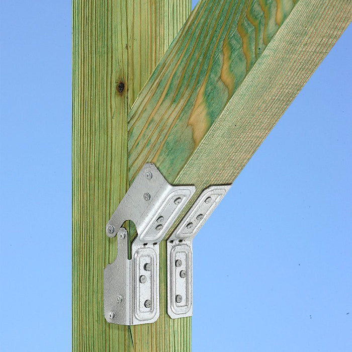 Metal bracket attached to wooden beams against a clear blue sky
