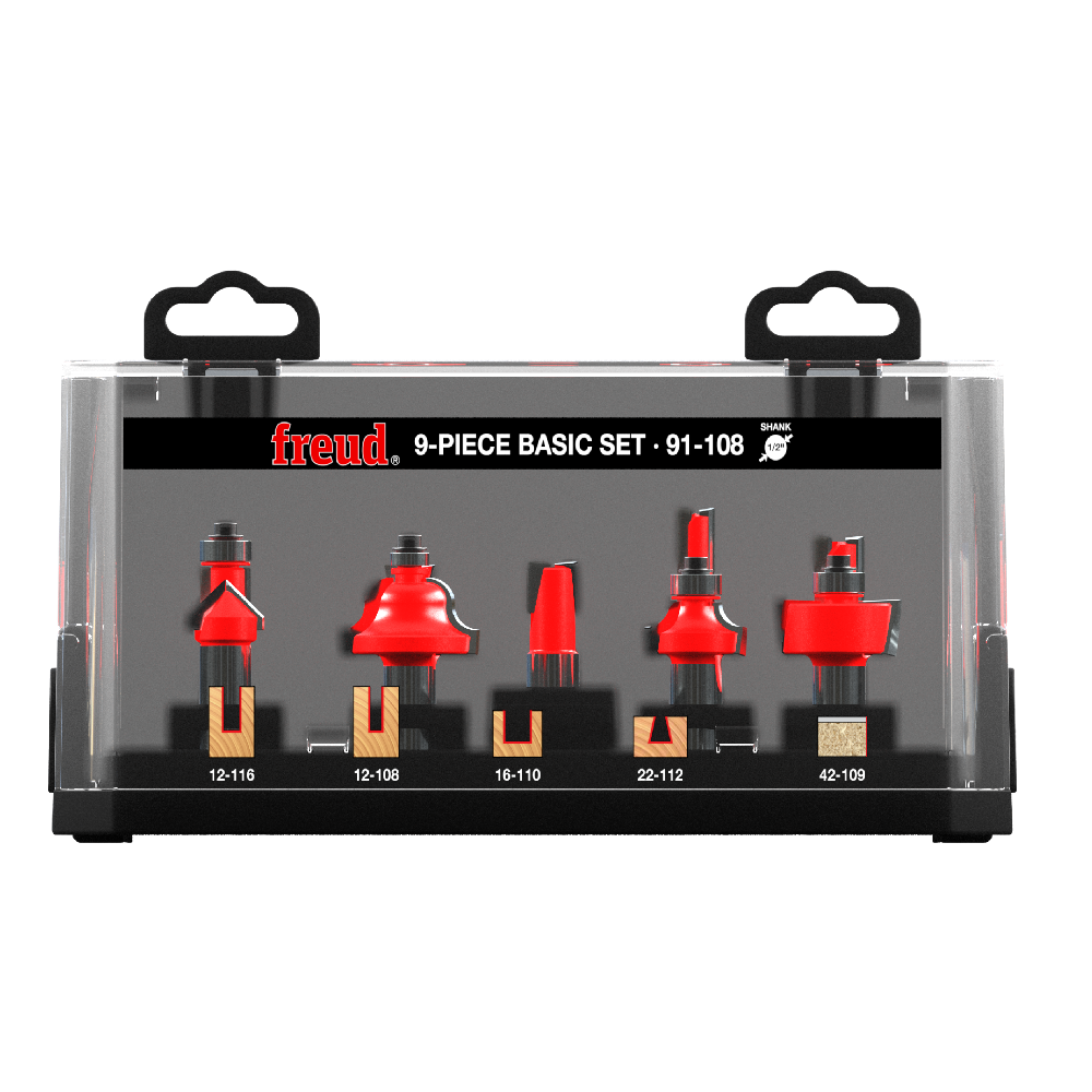Freud 9-piece basic router bit set in a clear plastic case with black hanger tabs, showing red and silver router bits with wood inserts.