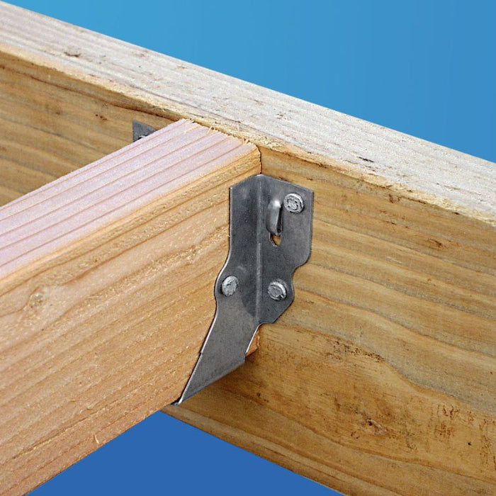 Wooden beam with metal bracket against a blue background