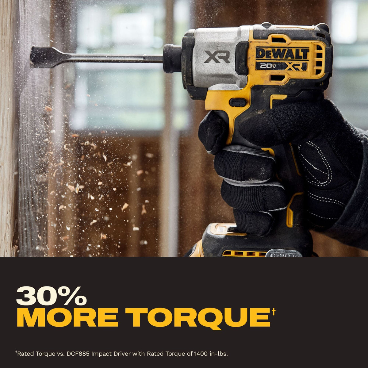 A DeWalt XR 20V+1 cordless impact driver with a spade bit being used by a gloved hand in a construction setting, with wood shavings flying and a dark banner at the bottom reading '30% MORE TORQUE'.