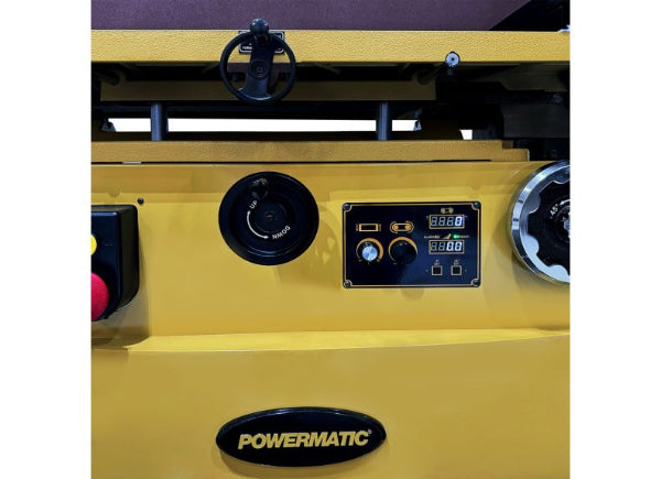 Yellow band saw with Powermatic branding on a white background