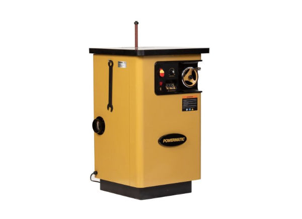 Yellow powermatic machine on a white background